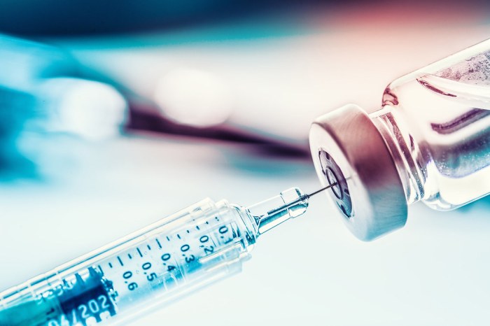COVID-19 vaccine | Close-up medical syringe with a vaccine. | Alachua ... Vaccine actions policy positions under us health secretary kennedy