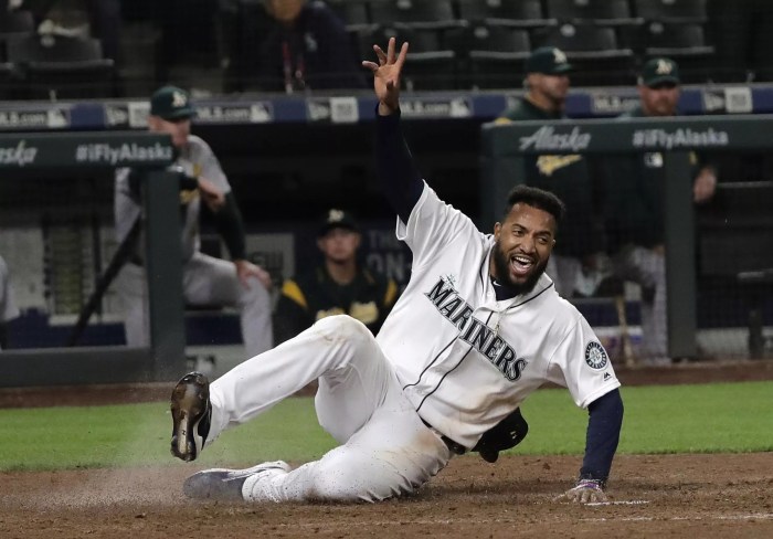 Mariners rally to defeat Oakland in extra innings, snap four-game skid ... D backs pile up extra base hits rout mariners