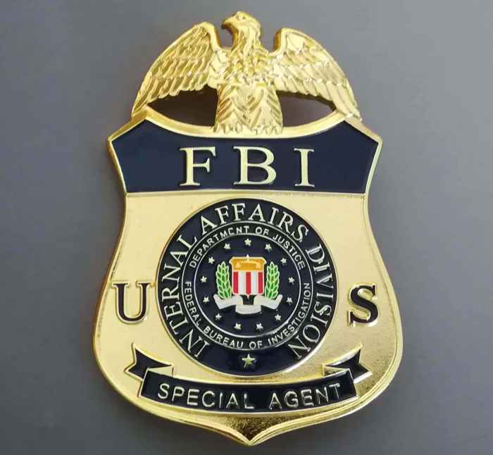 Download Fbi Badge With Eagle And A Badge | Wallpapers.com Fbi investigating targeted terror attack boulder colorado director says