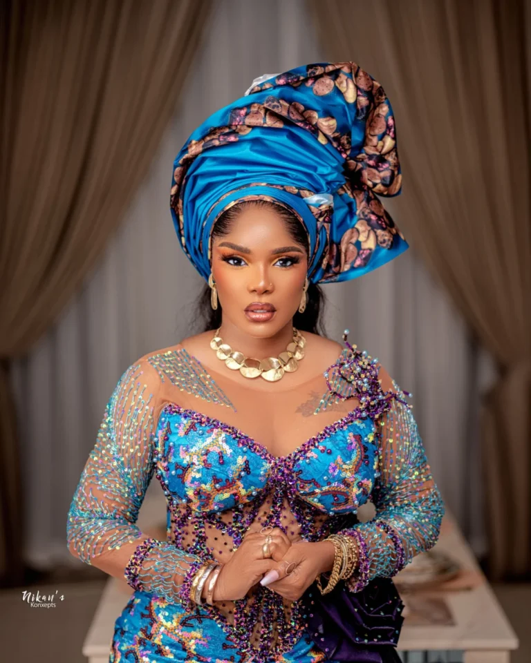 Iyabo Ojo Stuns in a Turquoise and Purple Aso Ebi Masterpiece, Setting New Standards for Traditional Elegance